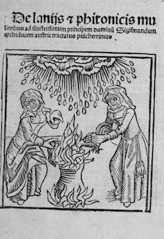 Illustration of witches with a cauldron and rain.