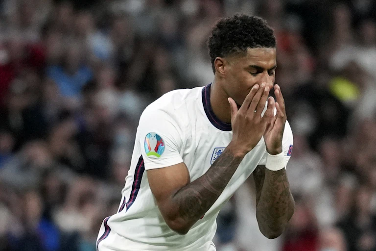 Marcus Rashford reacts after missing a penalty shot in the Euro 2020 final