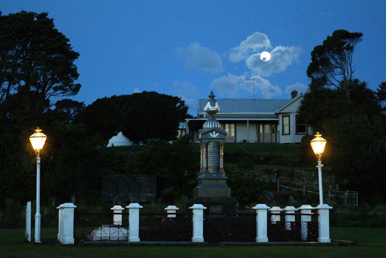 Burial place of Parihaka founder Te Whiti with moon rising above