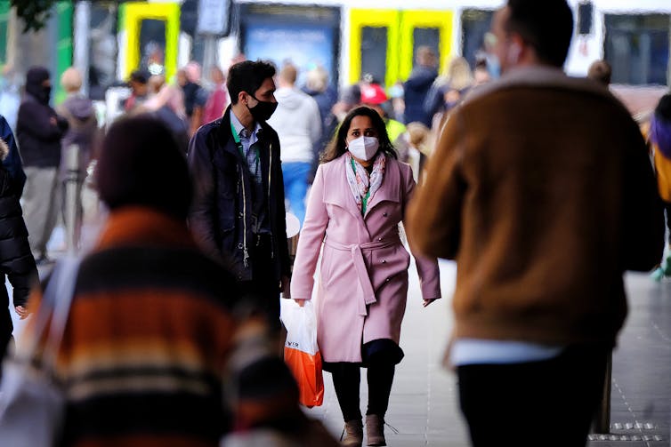 People wearing masks in Melbourne.