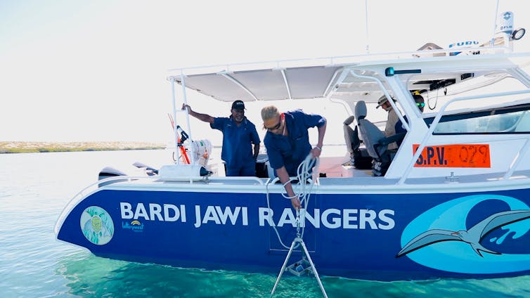 two men on boat