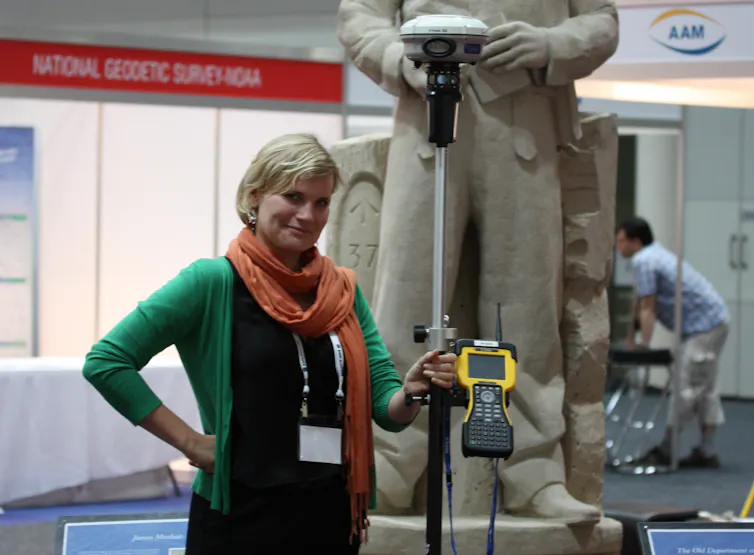 Surveyor with modern tools.