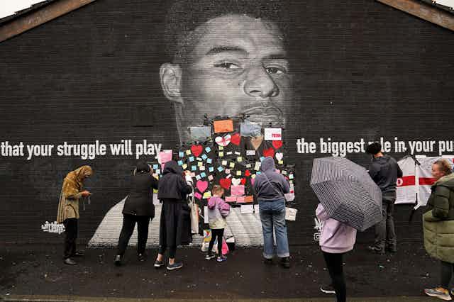 Marcus Rashford mural covered with messages of support after being defaced with racist abuse following Euros 2020