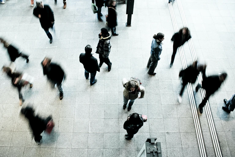 People walking around at an airport