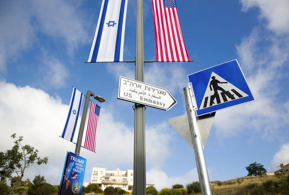A road sign leading to the U.S. Embassy is seen ahead the official opening in Jerusalem, Sunday, May 13, 2018. 