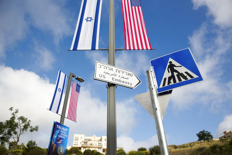 A road sign leading to the U.S. Embassy is seen ahead the official opening in Jerusalem, Sunday, May 13, 2018.