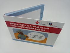 A small video booklet sitting on a table.