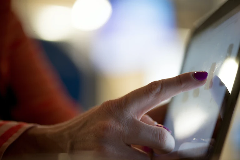 Finger touching device screen