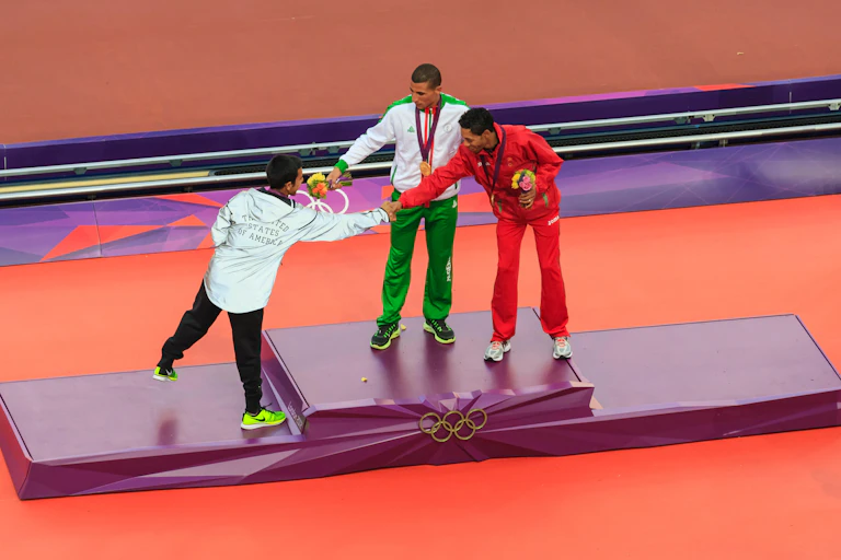 Athletes congratulate each other on the podium during the London 2012 Olympic Games