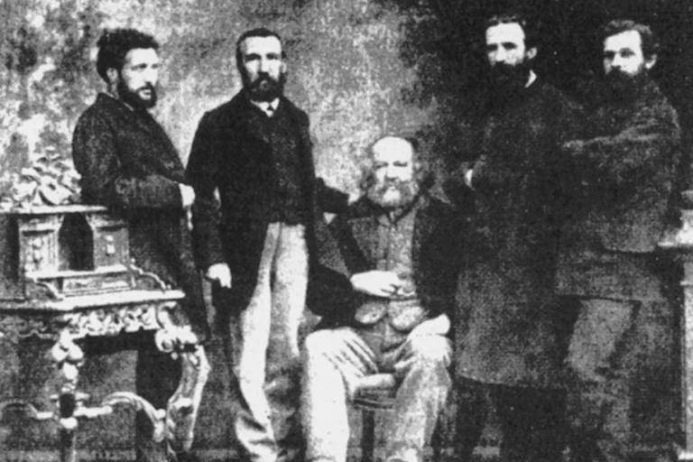 Mikhail Bakunin surrounded by fellow members of the International Workingmen's Association in a 1869 photo.