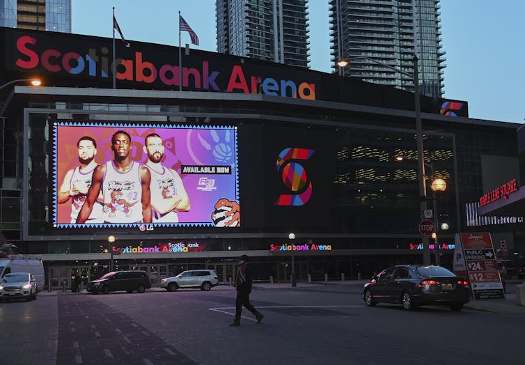 Scotiabank Arena with a billboard-sized image of the Toronto Raptors in front