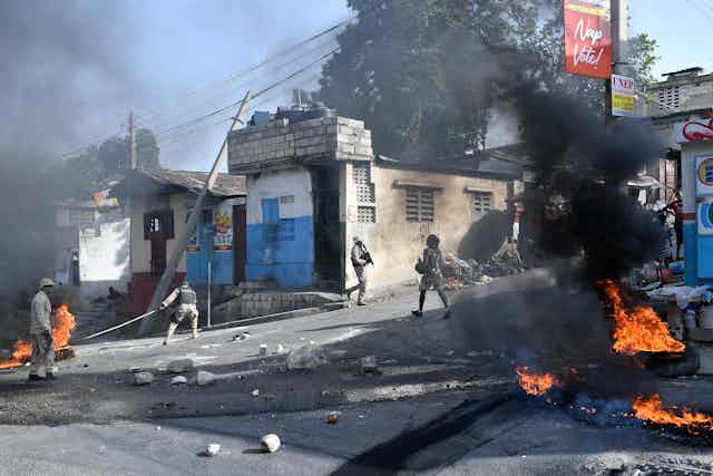 Tires are burning in the streets of Haiti.