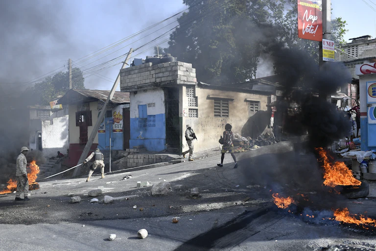 Tires are burning in the streets of Haiti.