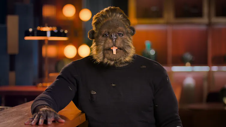 A man with the head of a beaver.