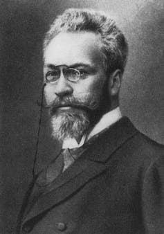 Portrait of a bearded man with glasses