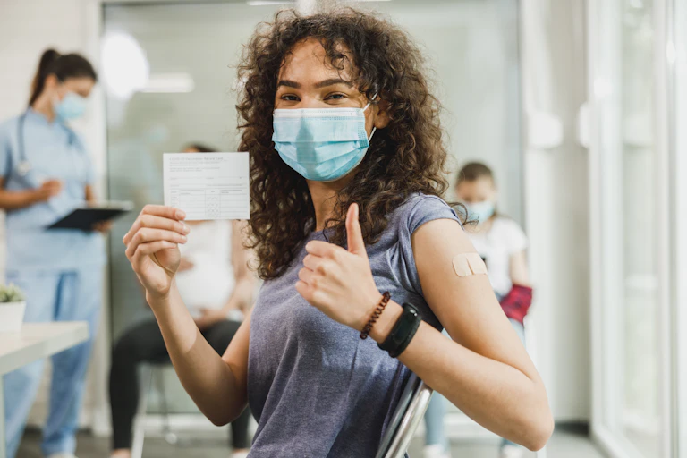 Teenager after getting COVID vaccine
