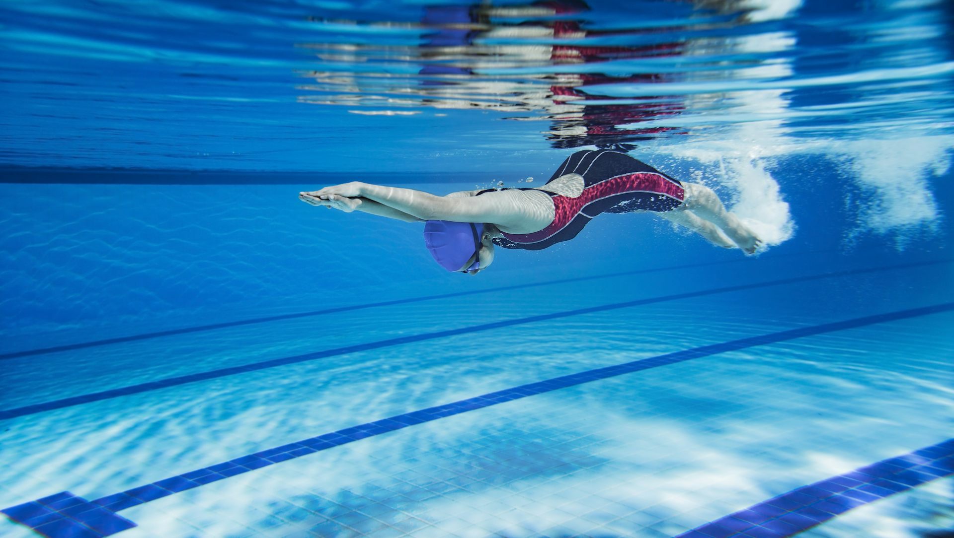 The science of underwater swimming how staying submerged gives Olympians the winning edge