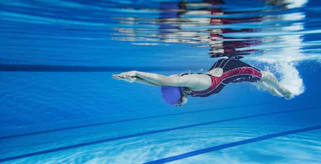 The science of underwater swimming: how staying submerged gives Olympians  the winning edge