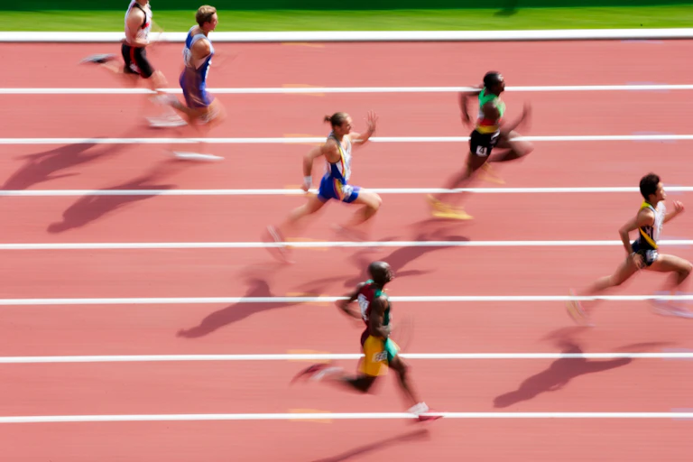 Sprinters on a race track.
