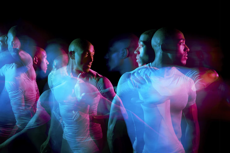 Multiple exposures of a man dancing.