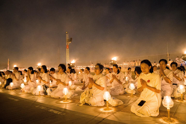 Buddhist devotees seen meditating with their lanterns at the Dhammakaya Temple in Bangkok during the yearly Makha Bucha ceremony, one of the most important day for Buddhists around the world.