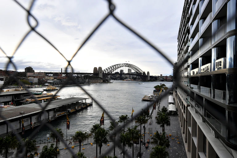 The Sydney Harbour Bridge behind wire fencing