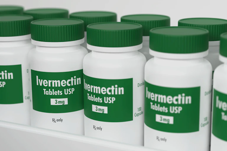 Rows of ivermectin bottles on a shelf