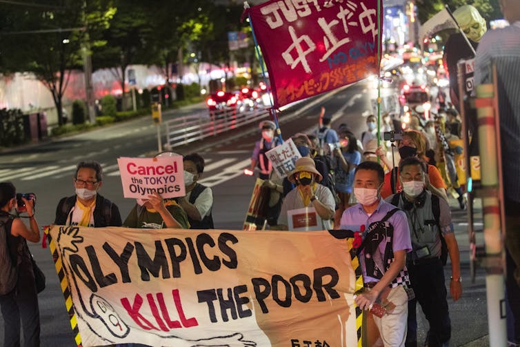 As the Tokyo Games begin, the stakes could not be higher for Japan — and the Olympics themselves
