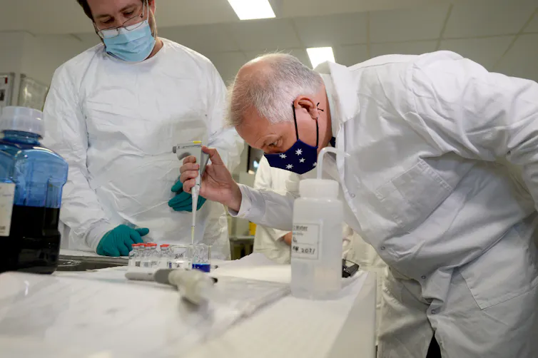 Prime Minister Scott Morrison poses for a photo at CSL's drug-making facility in Melbourne, March 26 2021