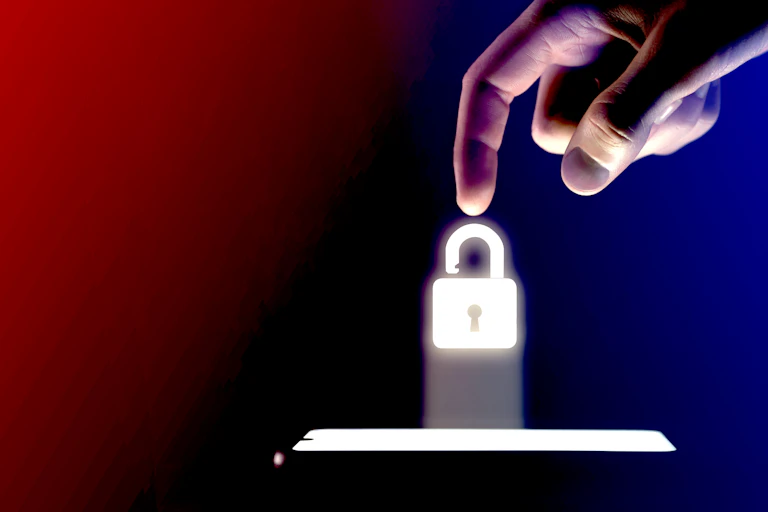 A hand hovers over a phone with an unlocked padlock