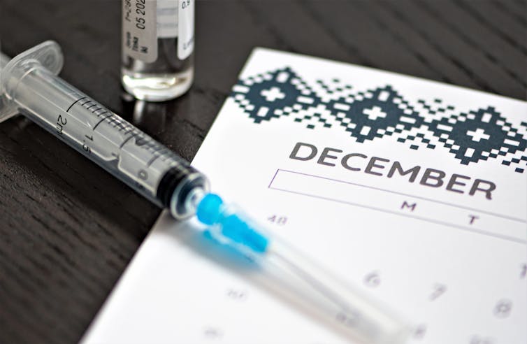 A syringe filled with flu vaccine