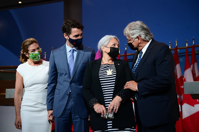 Sophie Trudeau, Justin Trudeau, Mary Simon and her husband stand together