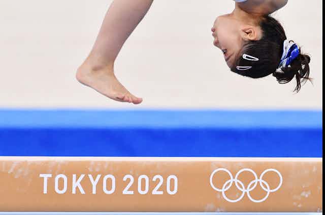 A gymnast training ahead of the Olympic games in Tokyo.