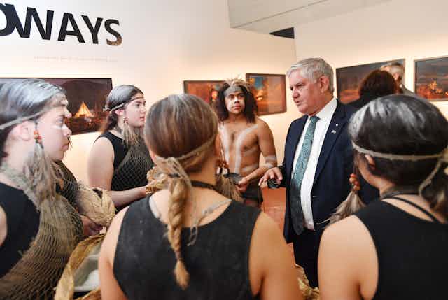 Minister for Indigenous Australians Ken Wyatt speaks with Kaurna Country performers at the meeting of the Joint Council on Closing the Gap.
