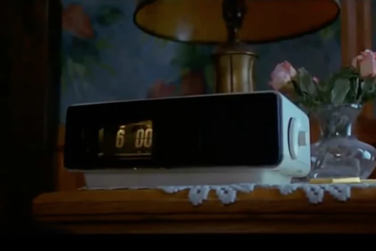 Alarm clock on bedside table