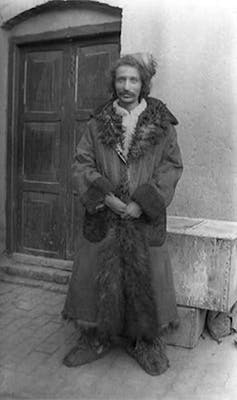 man in long coat