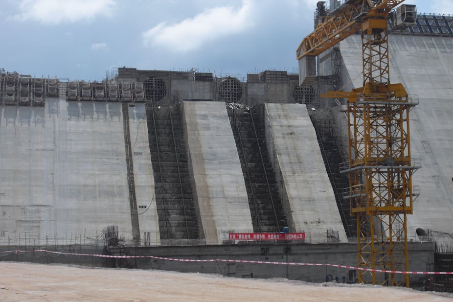 Crane and dam wall under construction