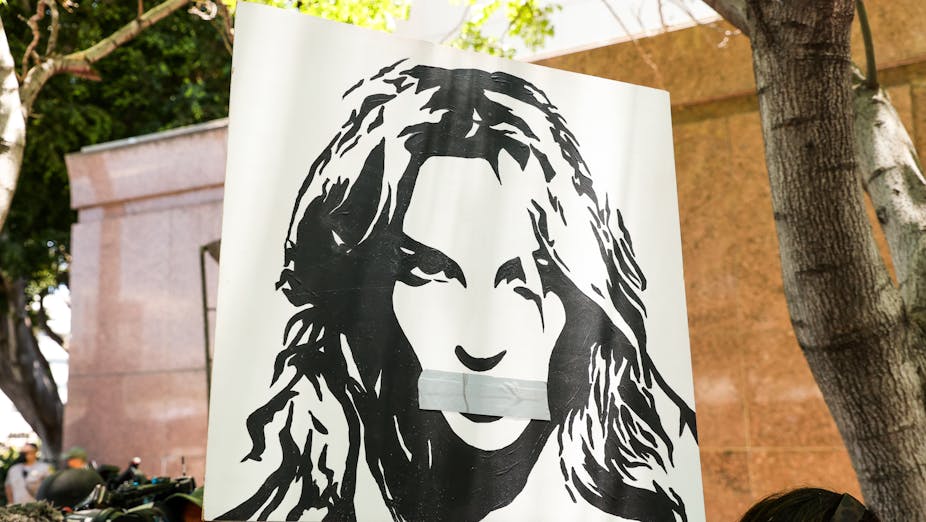 Poster of Britney Spears with duct tape over her mouth.