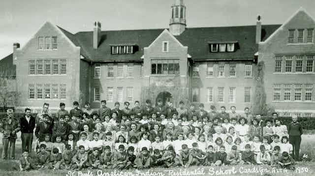 Picture of children in front of a residential school.