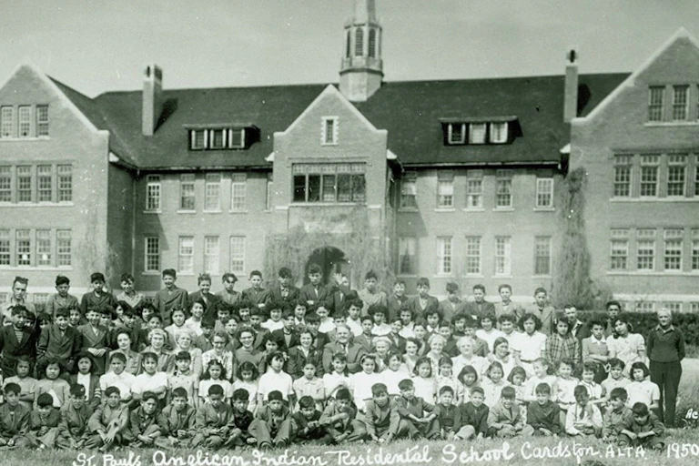 Picture of children in front of a residential school.