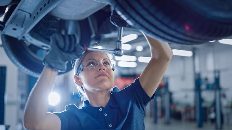 A woman mechanic.