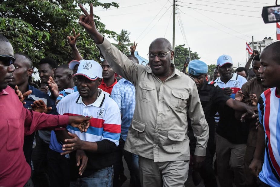 Tanzania’s CHADEMA party chairman Freeman Mbowe surrounded by supporters