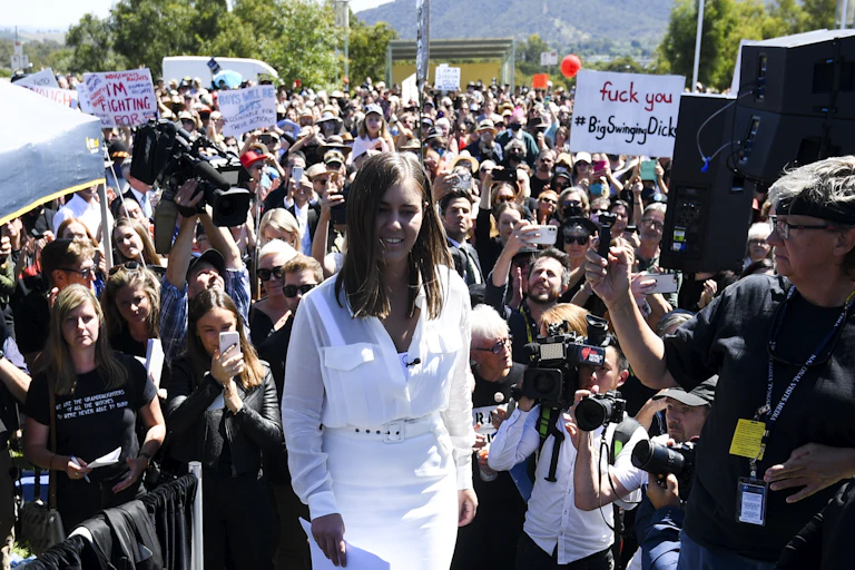 Brittany Higgins and protesters at the March 2021 women's march in Canberra.