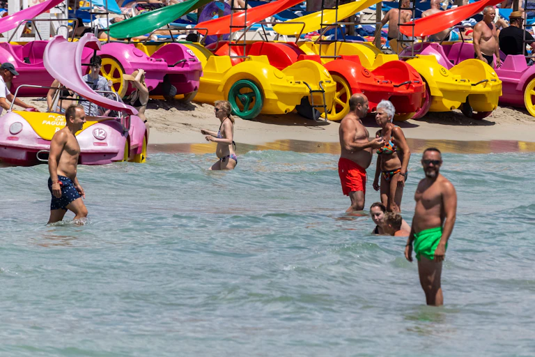 Holiday makers on a beach in Spain