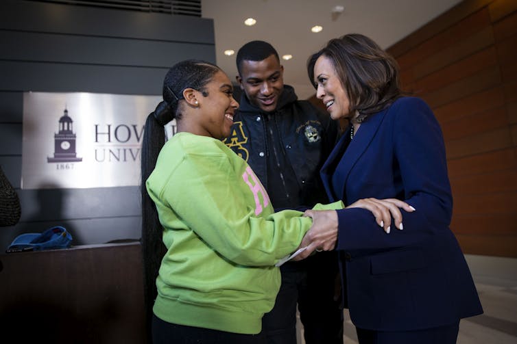 Kamala Harris greets a college student at Howard University