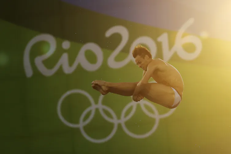 Tom Daley captured mid-dive at a 2016 Rio Olympics event.