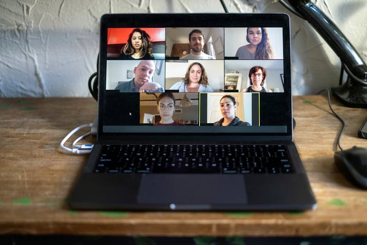A laptop with a Zoom meeting in progress
