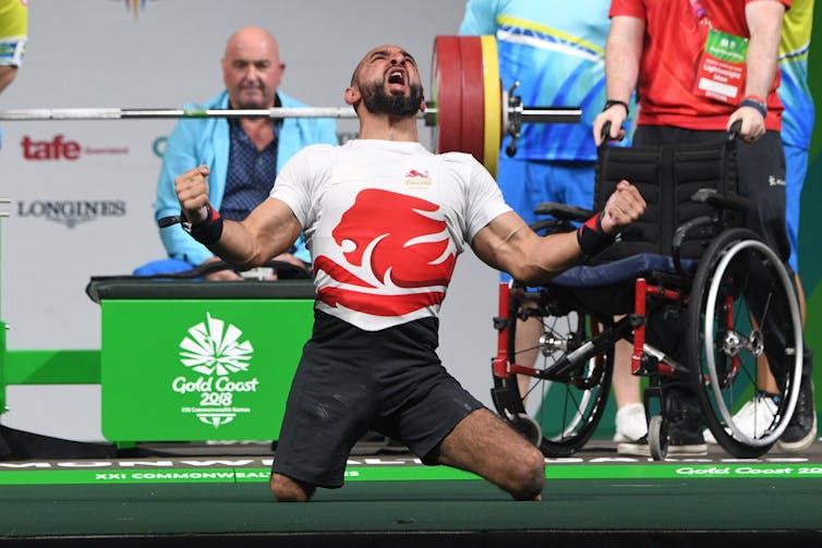 UK powerlifter Ali Jawad celebrates at the 2018 Commonwealth Games