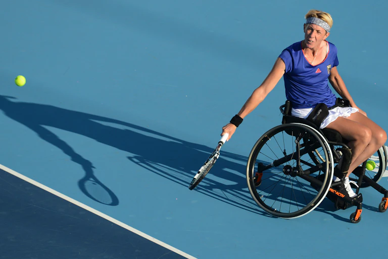 German tenniplayer Sabine Ellerbrock competes in a women's doubles match during the London 2012 Paralympic Games