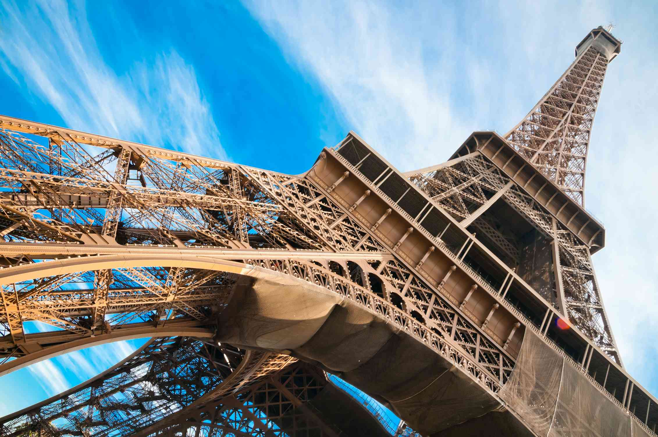 View of Eiffel Tower from the bottom, looking up